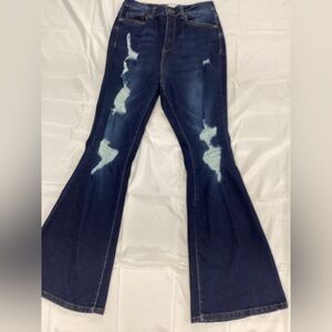 Wax Jean Dark Blue Distressed Flare Jeans. Stretch high waist.